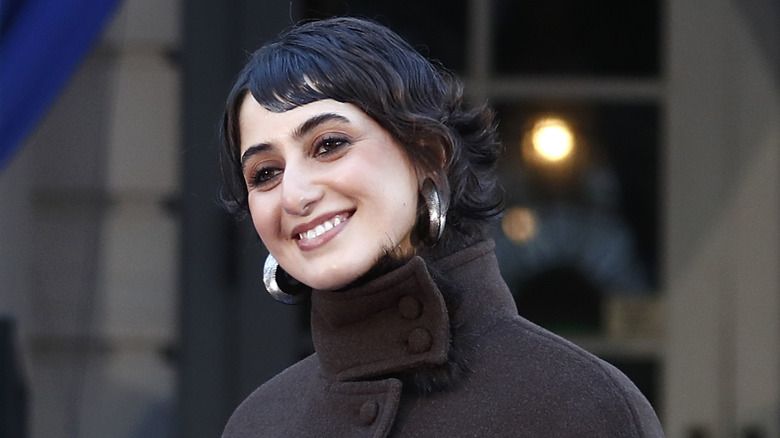 Rama Duwaji in a brown jacket outside at the inauguration of Zohran Mamdani