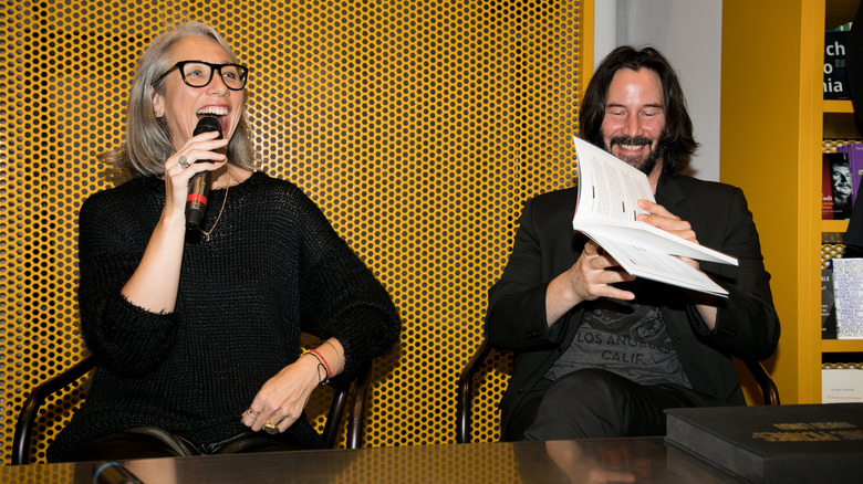 Alexandra Grant and actor Keanu Reeves attend the 'X Artists' books launch at Palais De Tokyo on November 10, 2017 in Paris, France