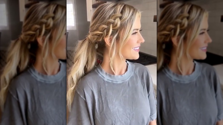 Christina Haack with her hair in a ponytail with a braid