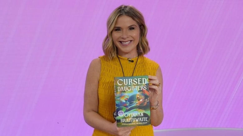 Jenna Bush Hager holding a copy of "Cursed Daughters" by Oyinkan Braithwaite