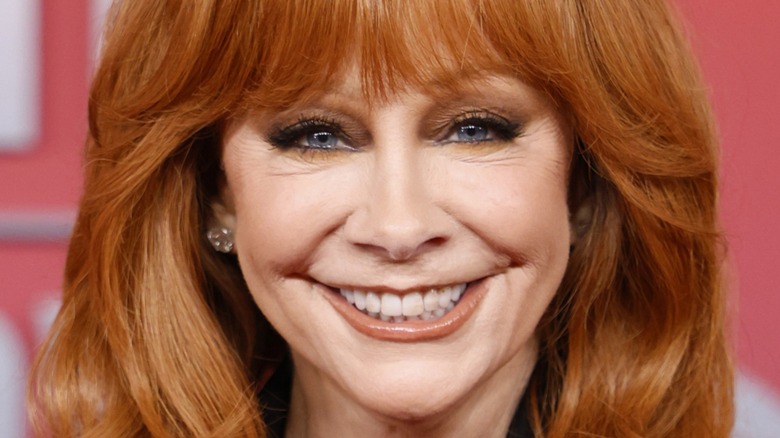 Reba McEntire smiling at the 2025 ACMs