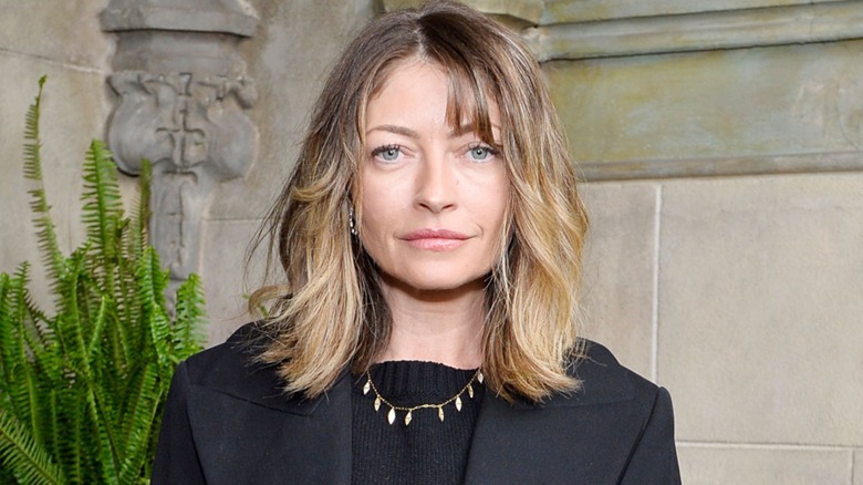 Rebecca Gayheart with a lob haircut wearing all black
