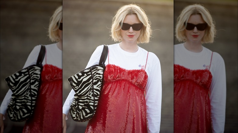 A woman in a red dress 