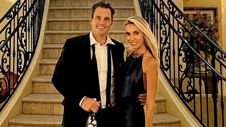 Bill Rancic and Giuliana Rancic posing with each other