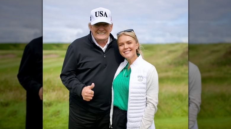 Karoline Leavitt and Donald Trump on a golf course in Scotland
