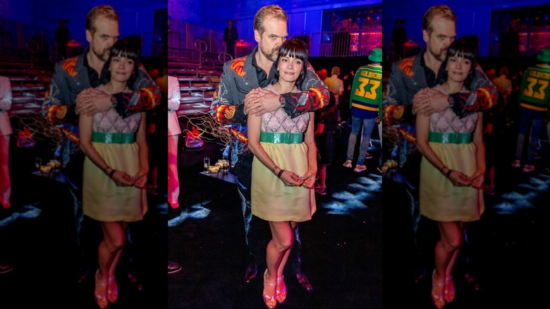 David Harbour and Lilly Allen posing and hugging
