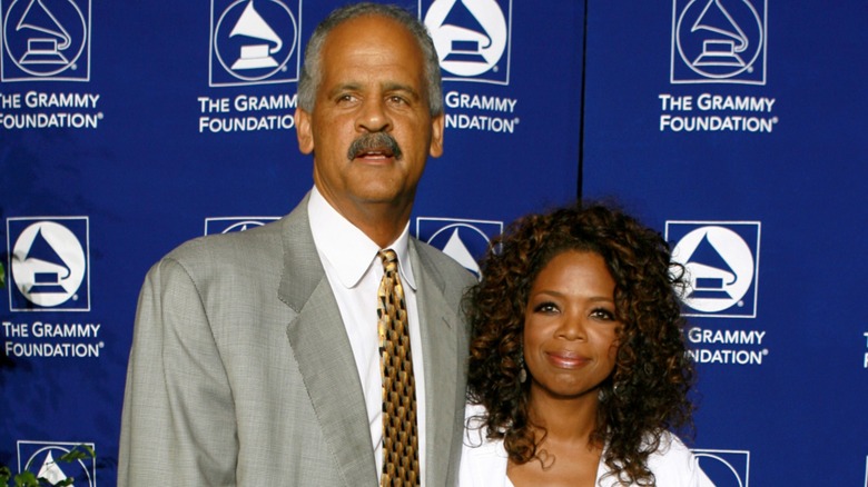 Stedman Graham posing with Oprah Winfrey on the red carpet