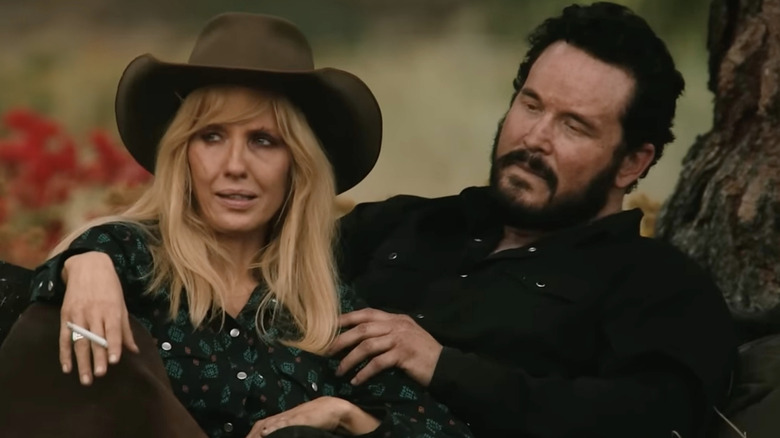 Beth Dutton in a cowboy hat and Rip Wheeler holding a cigarette