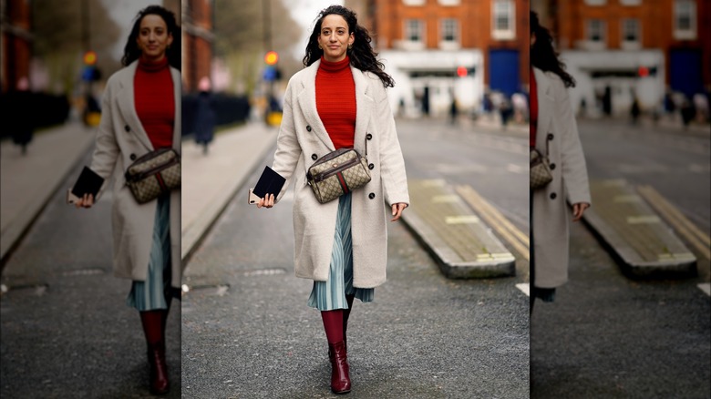 A woman in a red sweater 