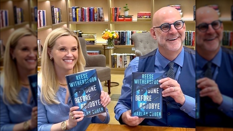 Reese Witherspoon and Harlan Coben holding copies of Gone Before Goodbye