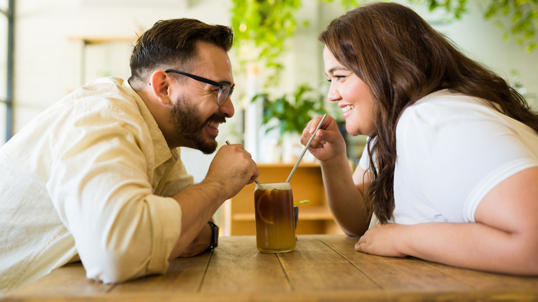 Couple sharing a drink