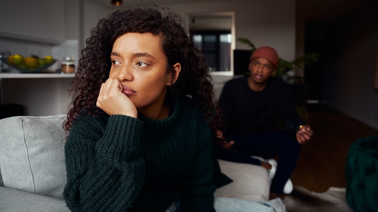 Woman ignoring man