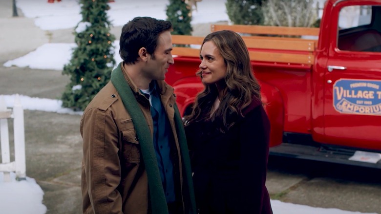 A couple in "The Christmas Promise" outside in the snow