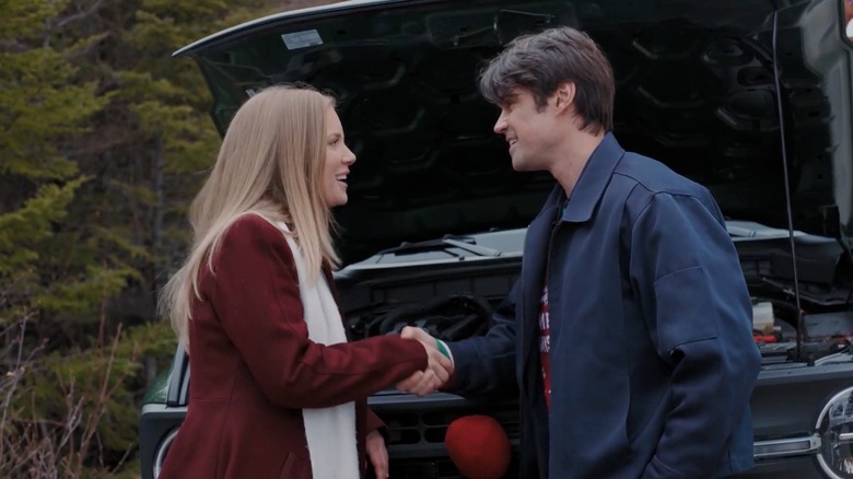 LJ and Carl shaking hands in "Everything Christmas"
