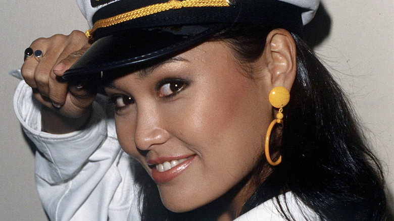 Tia Carrere pictured smiling circa 1990s