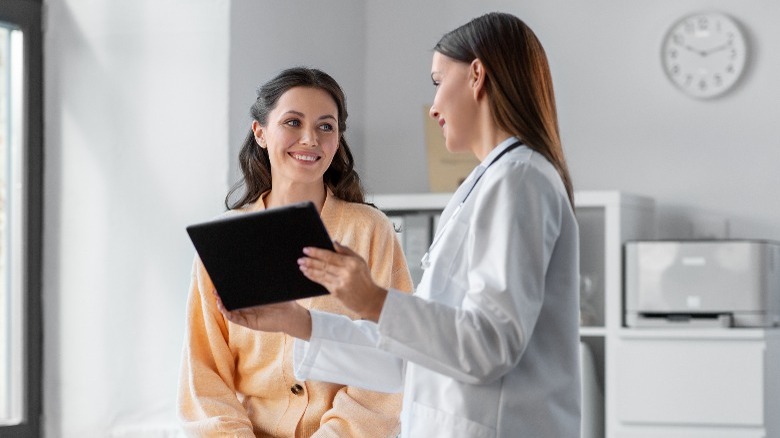 Woman consults with doctor