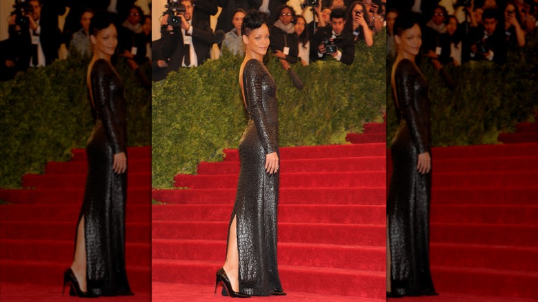 Rihanna at the 2012 Met Gala in a black Tom Ford gown