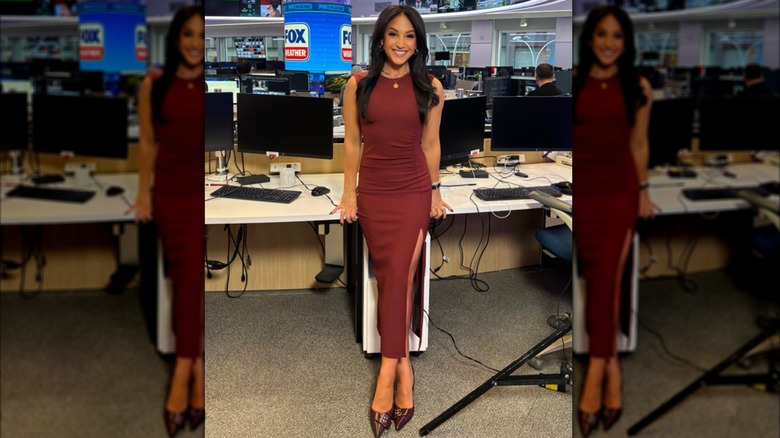 Emily Compagno posing behind the scene of Fox News