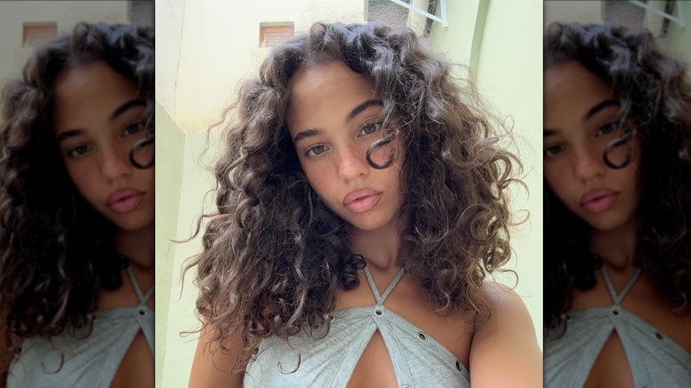 A woman with curly hair