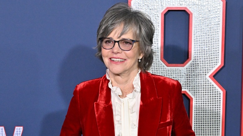 Sally Field in an velvet blazer and ruffled white shirt