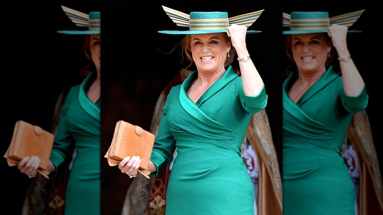 Sarah Ferguson in a teal dress with a teal hat