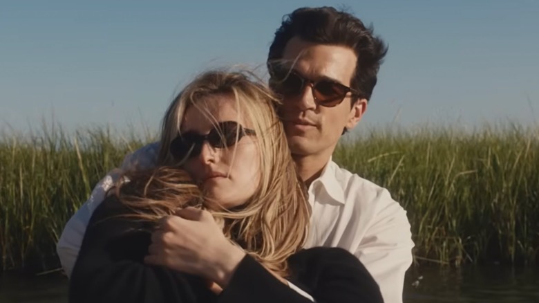 Sarah Pidgeon and Paul Anthony Kelly in a boat on FX's Love Story: John F. Kennedy Jr. & Carolyn Bessette