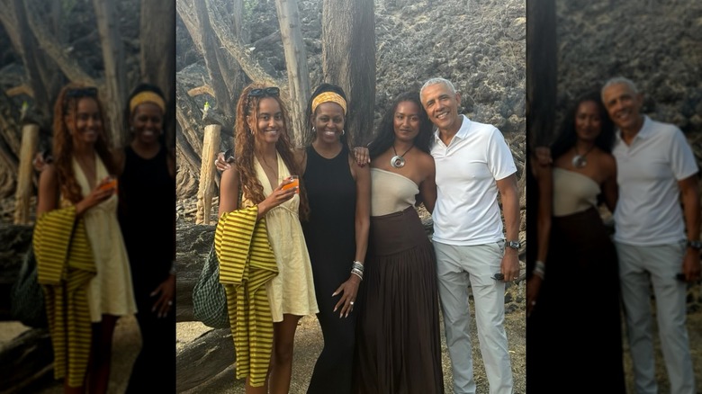 Malia, Michelle, Sasha, and Barack Obama smile for a photograph