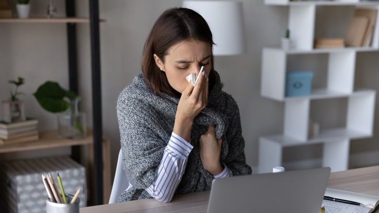 Woman sick at work