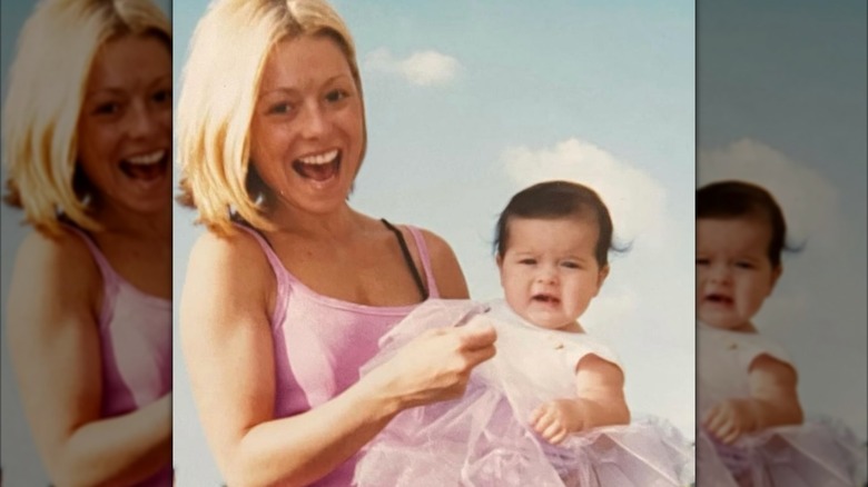 Kelly Ripa holds daughter Lola Consuelos in a photo from 2001