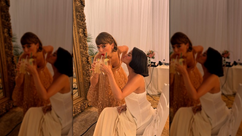 Taylor Swift and Selena Gomez drinking cocktails while doing wedding beauty