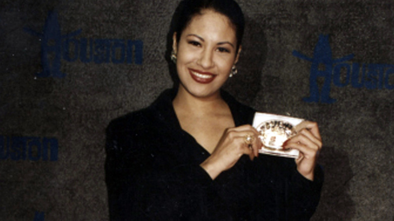 Selena posing backstage at the Houston Livestock Show & Rodeo