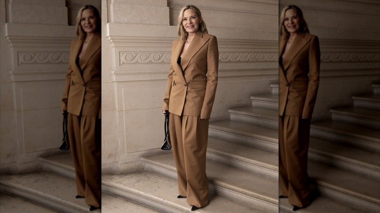 Kim Cattrall wearing a brown suit