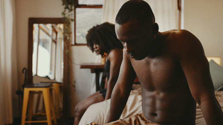 Couple upset in bed