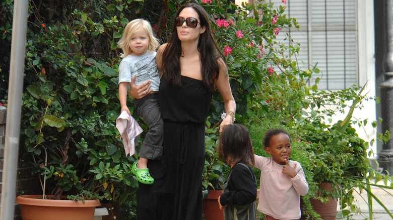Angelina Jolie out with her kids in 2008
