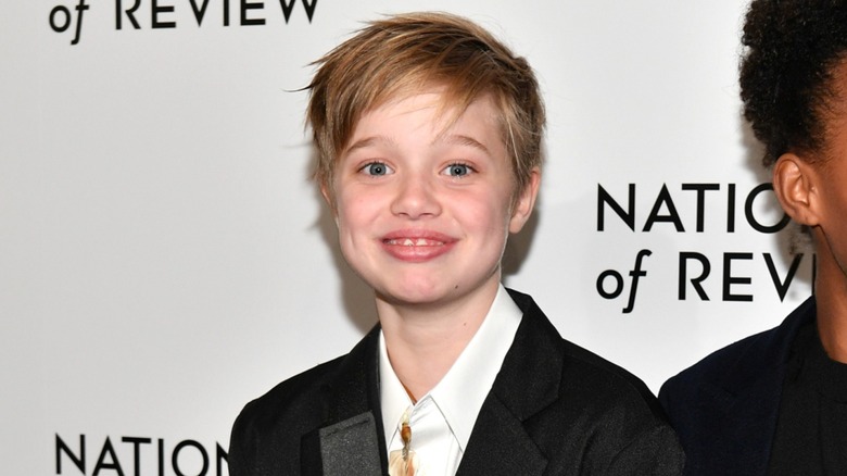 Shiloh Jolie smiling on the red carpet in 2018