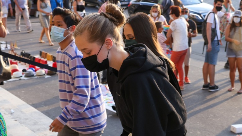 Shiloh Jolie wearing a mask while out in 2021