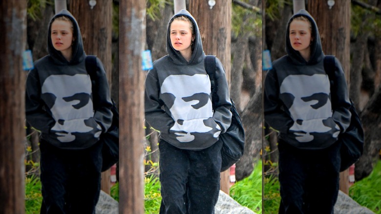 Shiloh Jolie walking outside in 2025