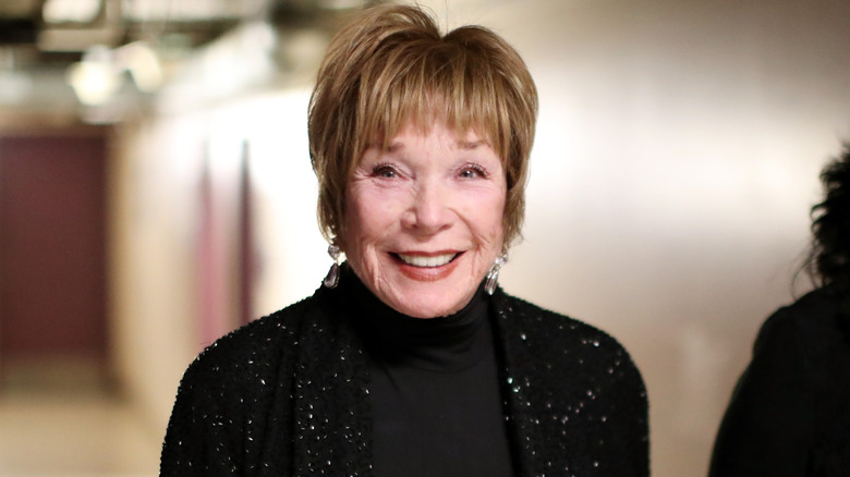 Shirley MacLaine smiling backstage in 2017