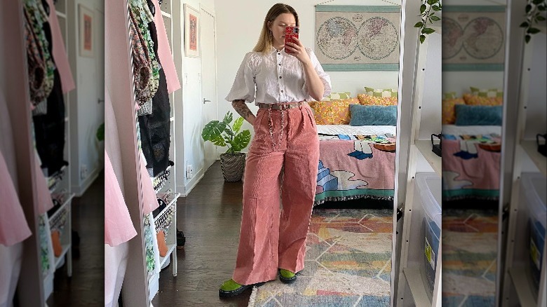 woman taking mirror selfie