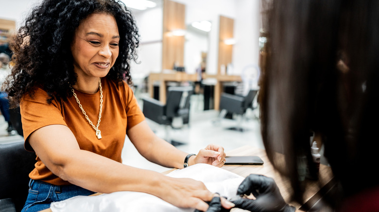 Woman getting a manicure