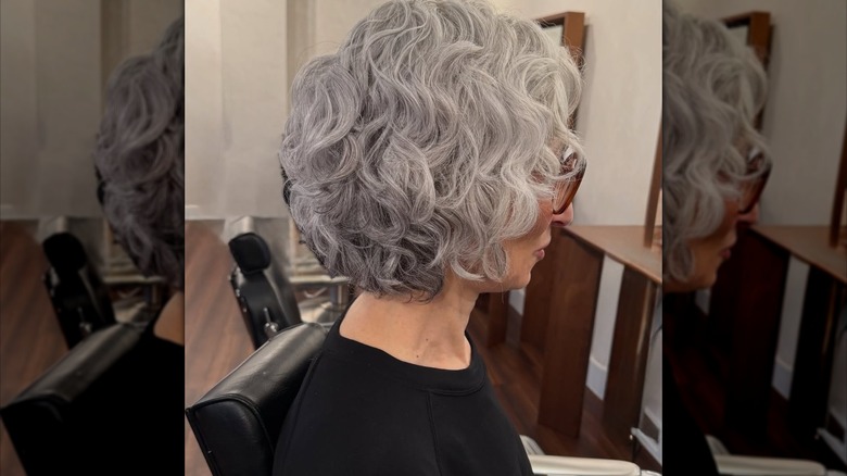 Woman with loosely curled bob