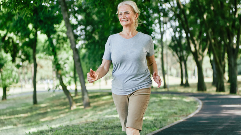 Woman jogging while in the park