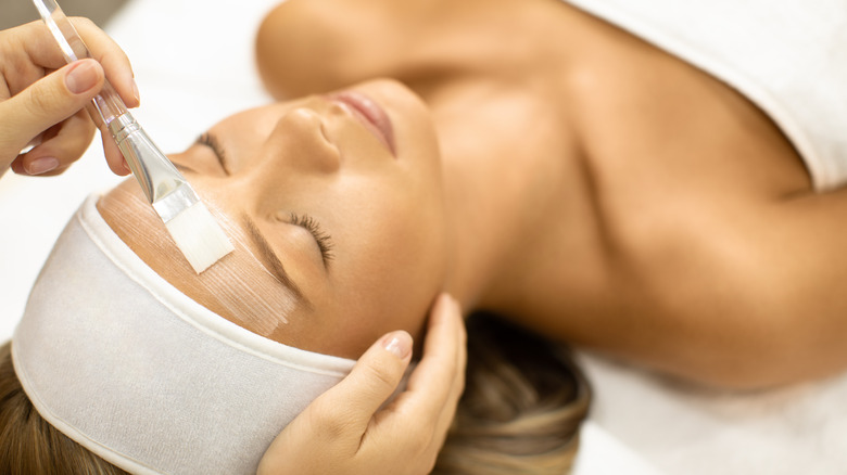 Woman getting a facial treatment