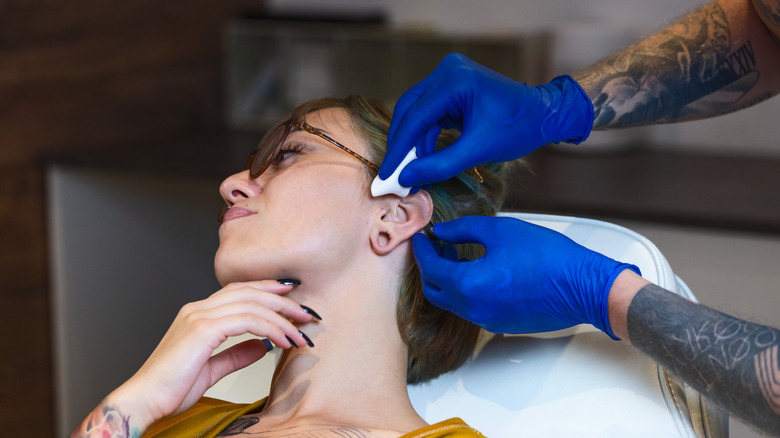 Wiping fresh piercing
