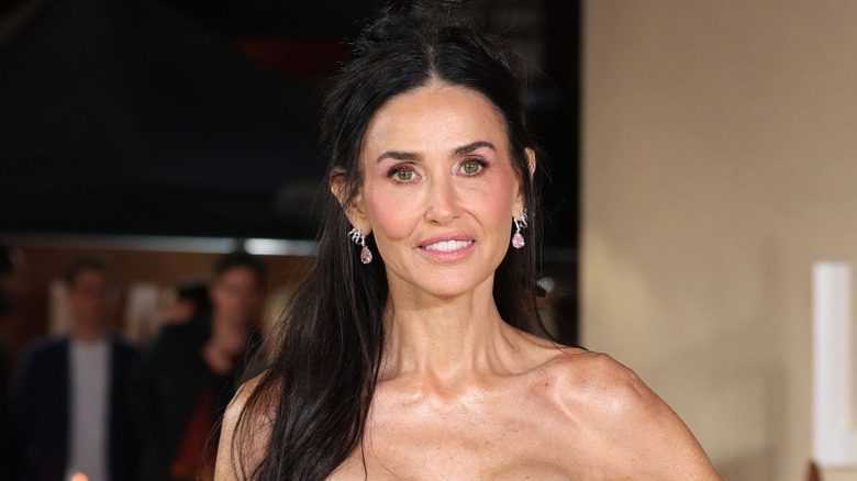 Demi Moore wearing pink drop earrings