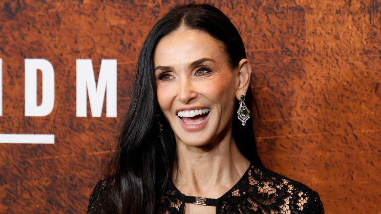 Demi Moore wearing a black dress