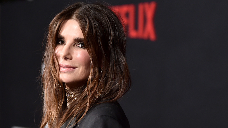Sandra Bullock smiles on the red carpet in 2021