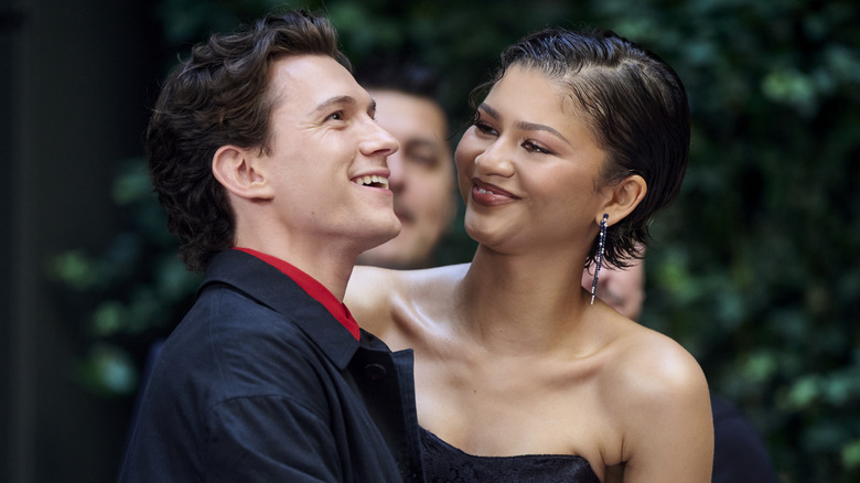 Tom Holland and Zendaya smiling together