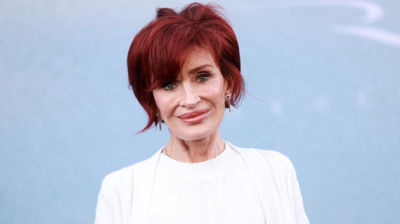 Sharon Osbourne smiles on the red carpet in 2024