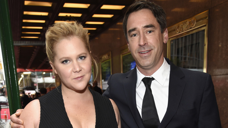 Amy Schumer and Chris Fischer at an event